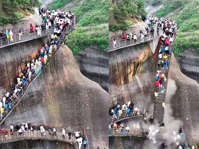 Viral Video: खड़े पहाड़ पर चढ़ रहे थे लोग, फिर भरभराकर गिरीं सीढ़ियां, लोग भी निकले सयाने, समझ लिया खेल!
